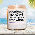 a candle with a quote on it sitting on a table