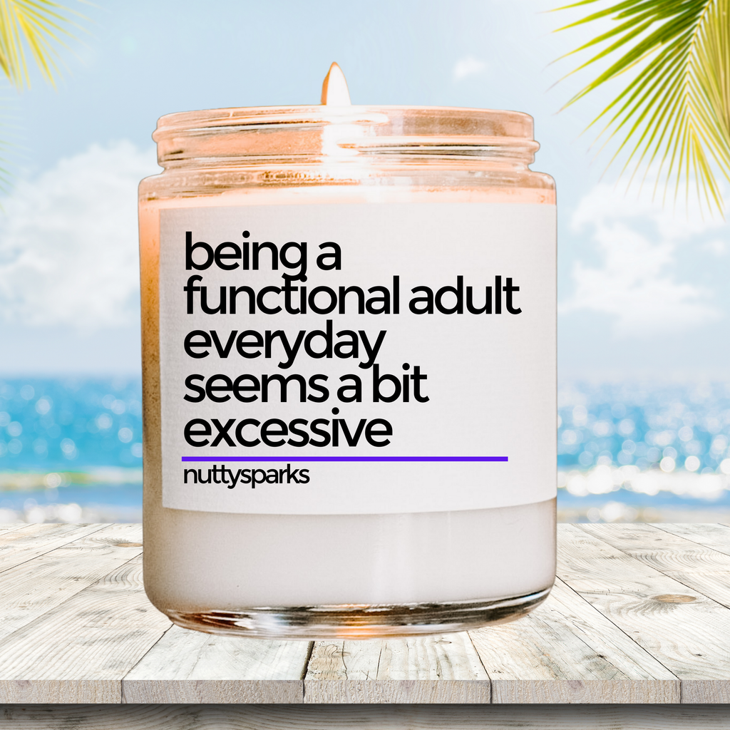 a candle with a quote on it sitting on a table