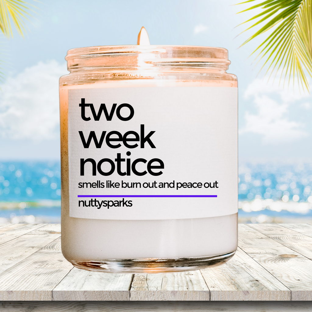 a jar of two week notice candle sitting on a table