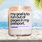 a candle with a quote on it sitting on a table