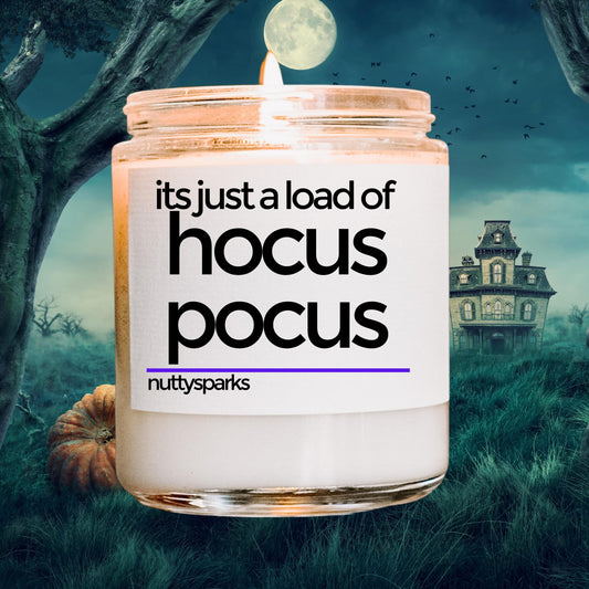 a jar of hoccus pocus with a house in the background