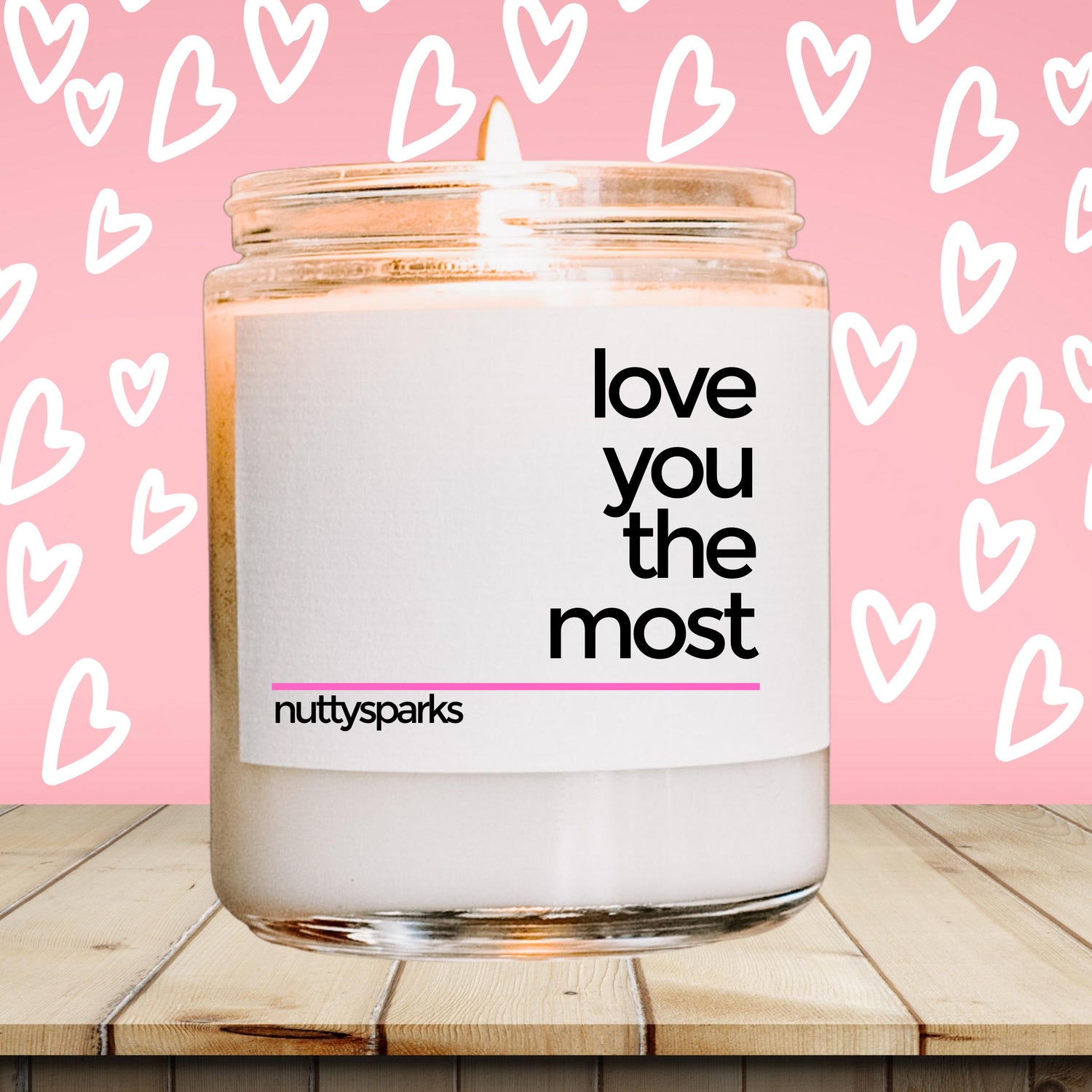 a jar of love you the most on a wooden table