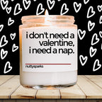 a jar of valentine&#39;s day candles sitting on a table