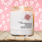a white candle with a pink background with hearts